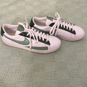 White and green painted nike sneakers